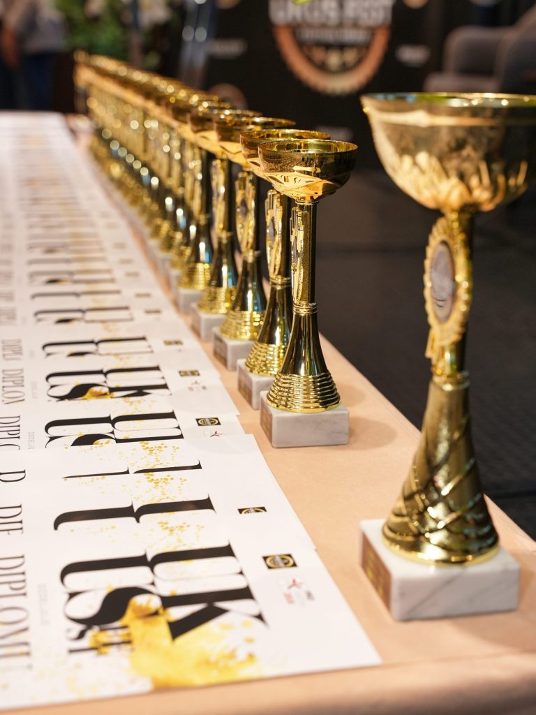 Trophies and diplomas prepared for an awards ceremony